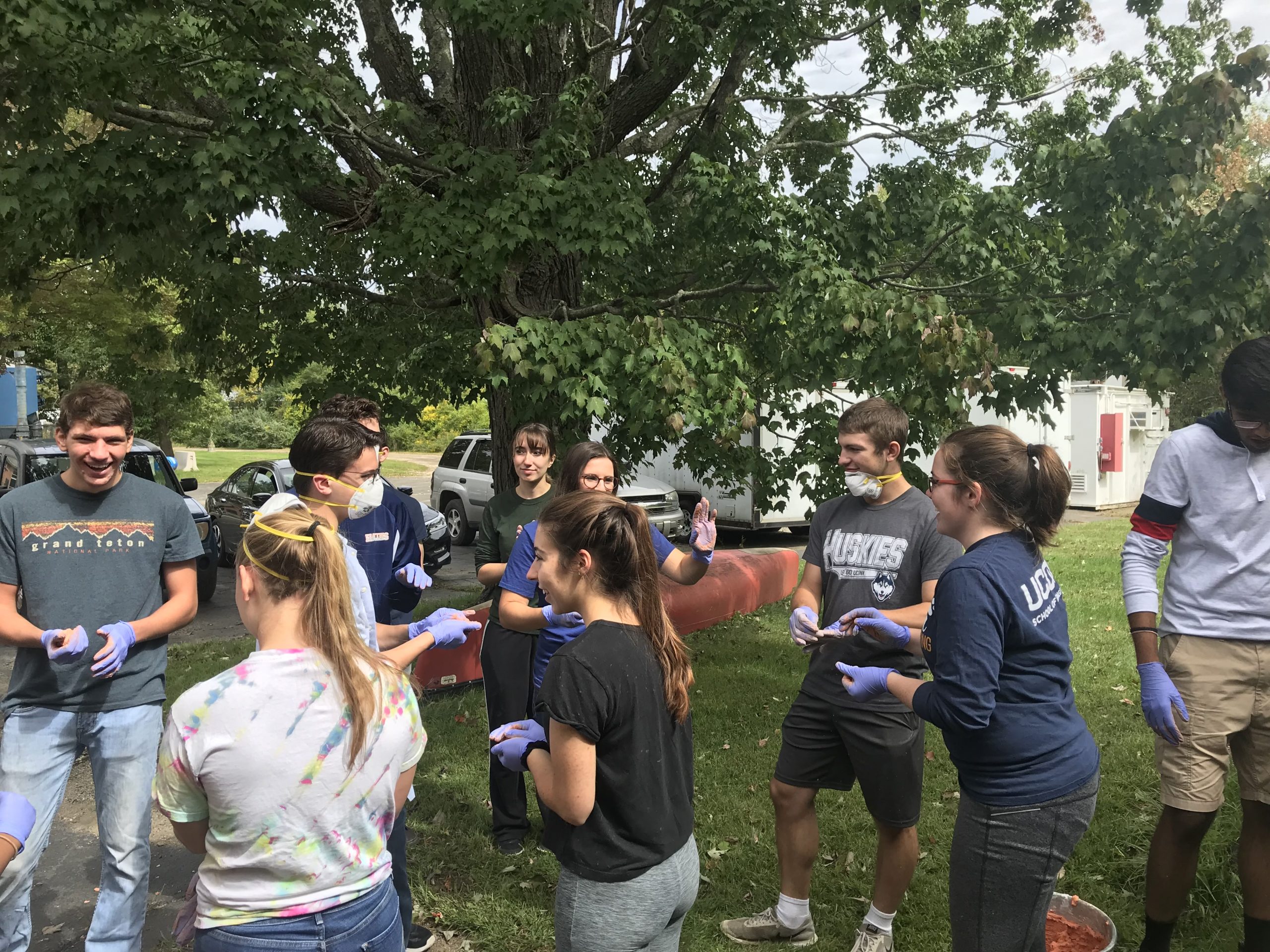 first meeting with new members exploring and creating with concrete outside